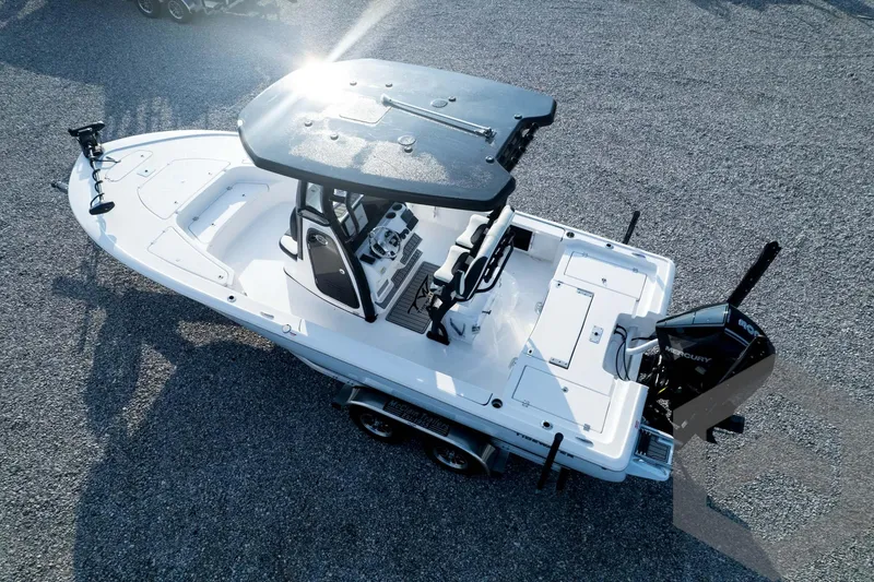 Slide: The Image of 2026 Tidewater 2410 Bay Max boat on trailer, top view, sunny day. - 94