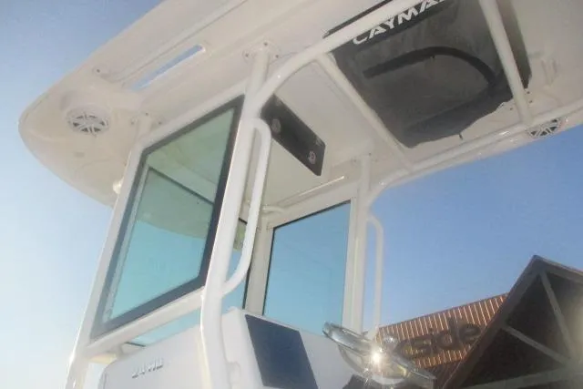 Slide: The Image of 2026 Caymas 24 HB boat console and T-top, showcasing sleek design and modern features. - 5