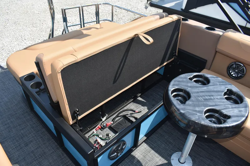 Slide: The Image of 2026 Godfrey SWEETWATER 2286 SFL boat interior with storage and cupholders. - 11