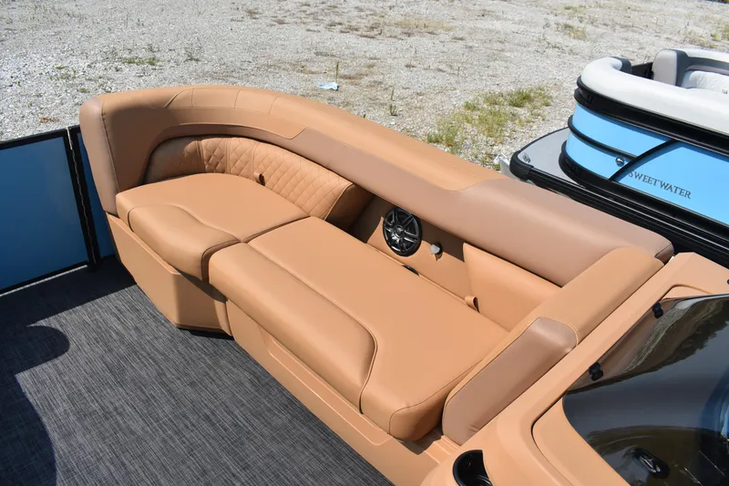 Slide: The Image of 2026 Godfrey SWEETWATER 2286 SFL boat interior with tan leather seating. - 17