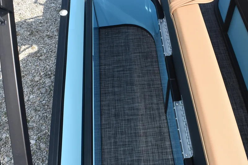 Slide: The Image of Interior view of 2026 Godfrey SWEETWATER 2286 SFL boat, featuring sleek flooring and seating. - 18