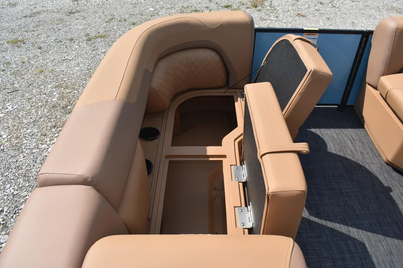 Slide: The Image of 2026 Godfrey SWEETWATER 2286 SFL boat interior with open storage compartment. - 23