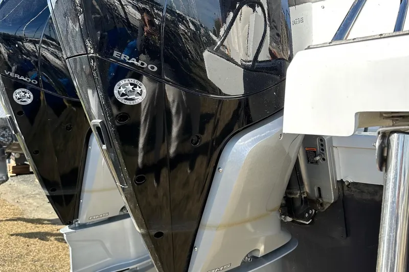 Slide: The Image of Close-up of 2022 Beneteau Antares 11 Fly outboard engines, featuring Verado branding. - 5
