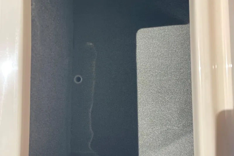 Slide: The Image of Interior view of a 2014 Grady-White Freedom 225 boat compartment. - 20