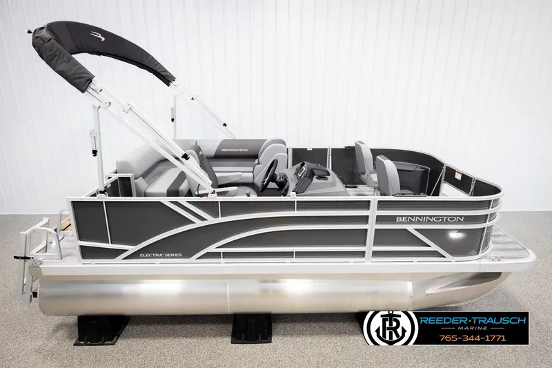 The Image of 2026 Bennington 168 SFSE pontoon boat, electric series, side view in showroom. - 1