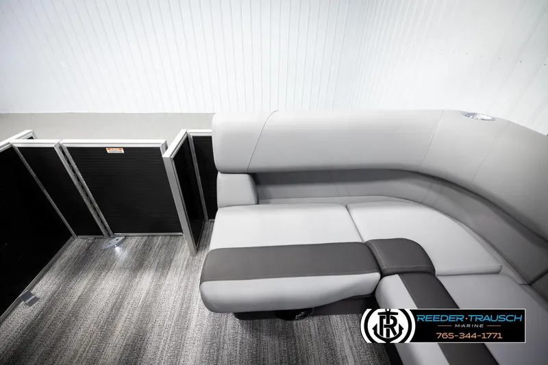 Slide: The Image of 2026 Bennington 168 SFSE boat interior with gray seating and carpeted flooring. - 15
