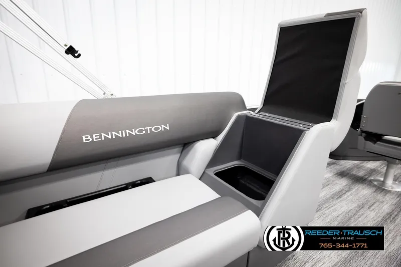 Slide: The Image of 2026 Bennington 168 SFSE boat interior with storage compartment open, showcasing sleek design. - 27