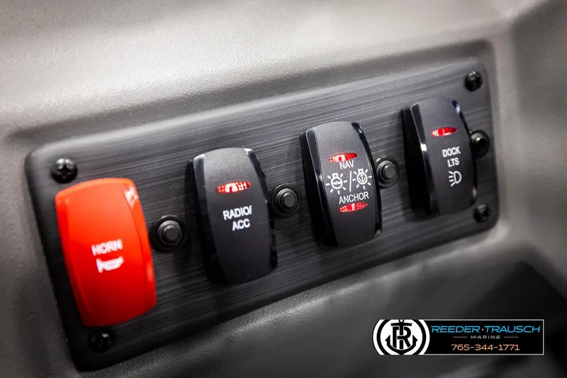 Slide: The Image of Control panel of 2026 Bennington 168 SFSE boat with labeled switches. - 31