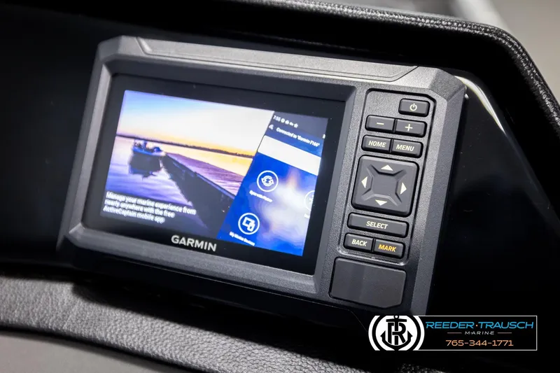 Slide: The Image of Garmin display on 2026 Bennington 168 SFSE boat dashboard, featuring navigation controls. - 34