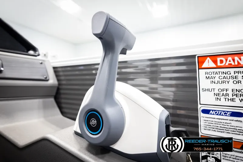 Slide: The Image of 2026 Bennington 168 SFSE boat throttle control with safety warning label. - 37