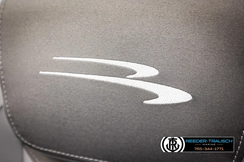 Slide: The Image of 2026 Bennington 168 SFSE logo on gray fabric with Reeder-Trausch Marine branding. - 39