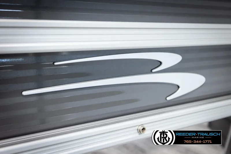 Slide: The Image of 2026 Bennington 168 SFSE boat detail with logo and Reeder-Trausch Marine branding. - 47