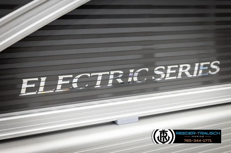 Slide: The Image of 2026 Bennington 168 SFSE Electric Series boat, close-up of branding and dealership logo. - 50