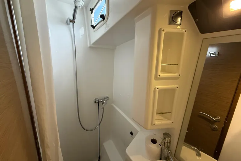Slide: The Image of Bathroom interior of 2015 Fountaine Pajot Summerland 40 LC yacht, featuring shower and sink. - 101
