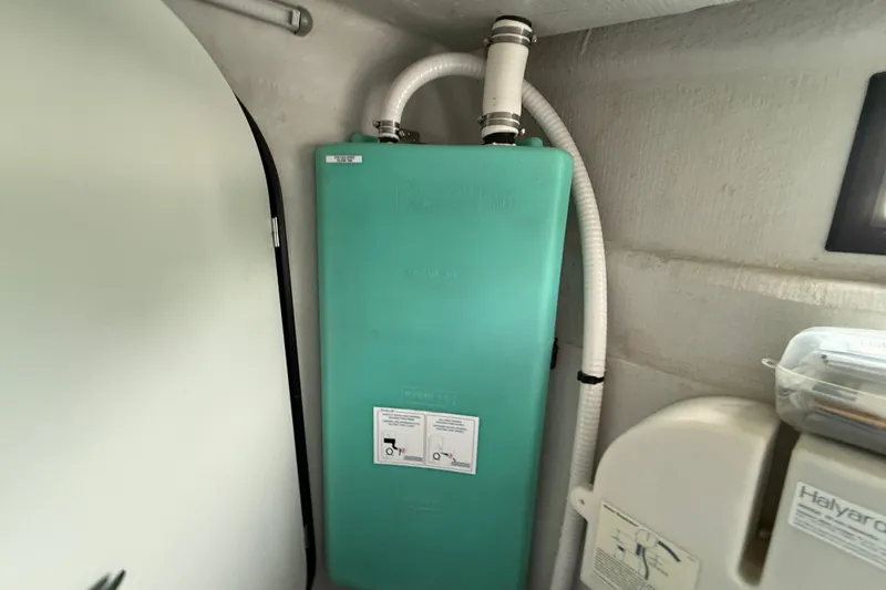 Slide: The Image of Green water tank in 2015 Fountaine Pajot Summerland 40 LC boat interior. - 110