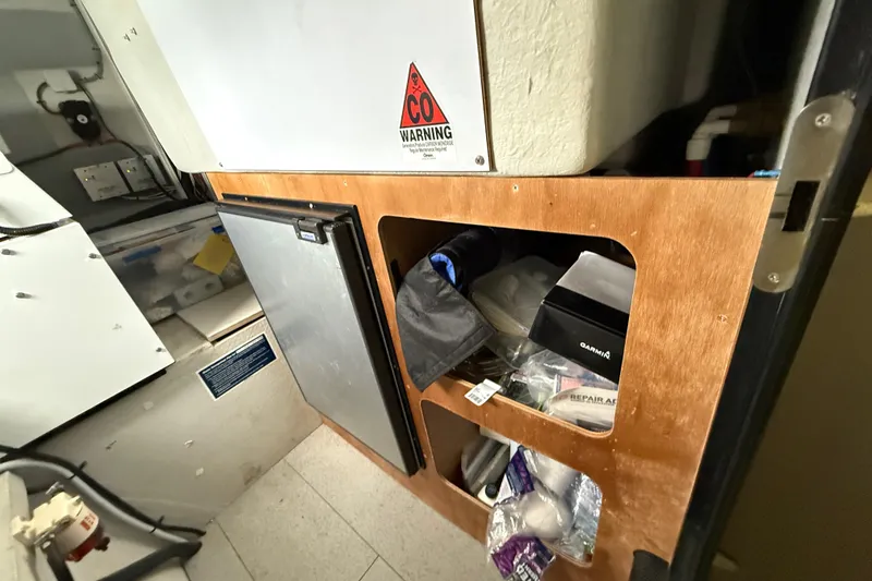 Slide: The Image of Interior of 2015 Fountaine Pajot Summerland 40 LC with storage and equipment. - 111