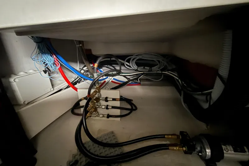 Slide: The Image of Electrical wiring and components inside a 2015 Fountaine Pajot Summerland 40 LC boat. - 116