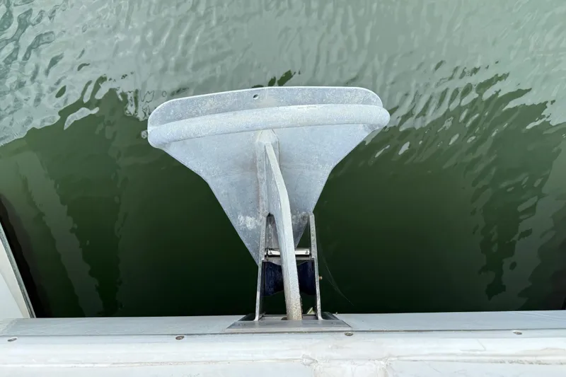 Slide: The Image of Anchor of 2015 Fountaine Pajot Summerland 40 LC over water. - 29