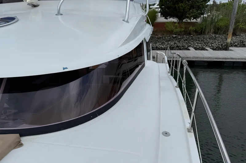 Slide: The Image of 2015 Fountaine Pajot Summerland 40 LC yacht docked at marina. - 34