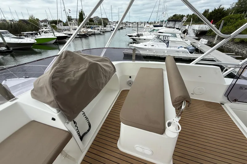 Slide: The Image of Flybridge view of 2015 Fountaine Pajot Summerland 40 LC at marina. - 44
