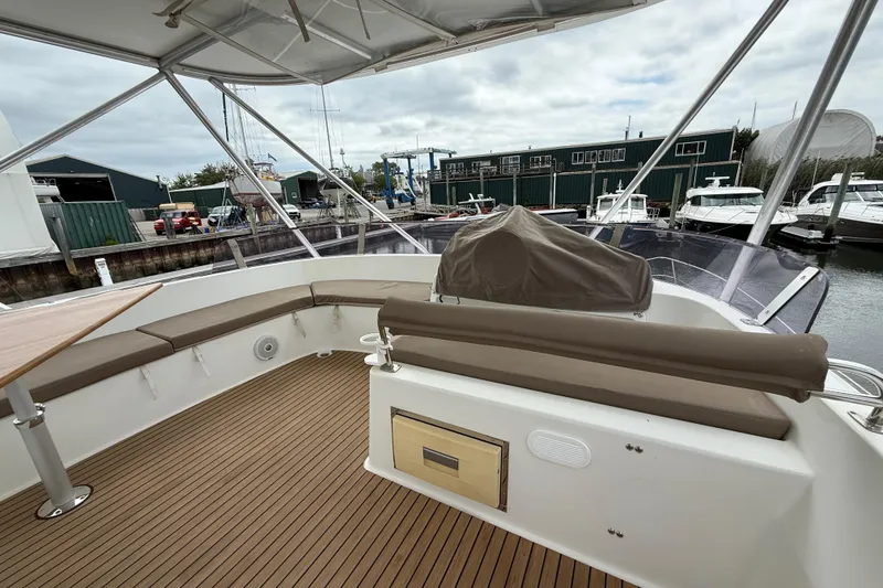 Slide: The Image of 2015 Fountaine Pajot Summerland 40 LC yacht deck with seating and covered helm. - 51