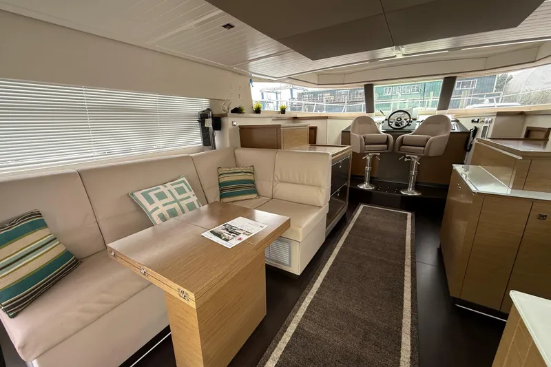 Slide: The Image of Luxurious interior of 2015 Fountaine Pajot Summerland 40 LC yacht with modern seating and helm. - 54