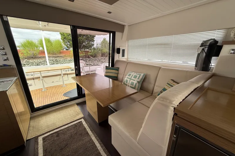 Slide: The Image of Interior of 2015 Fountaine Pajot Summerland 40 LC yacht with cozy seating and table. - 58
