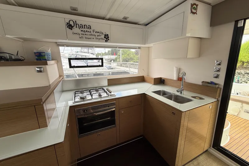 Slide: The Image of Modern kitchen in 2015 Fountaine Pajot Summerland 40 LC yacht with stove and sink. - 61
