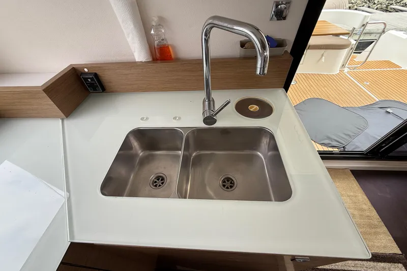 Slide: The Image of Kitchen sink area on 2015 Fountaine Pajot Summerland 40 LC yacht. - 64