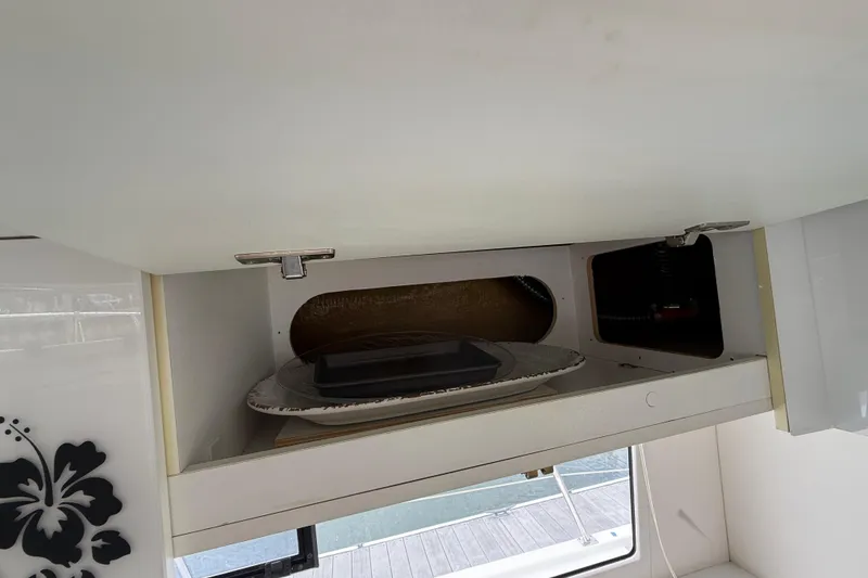 Slide: The Image of Cabinet interior on 2015 Fountaine Pajot Summerland 40 LC yacht, featuring storage space. - 67