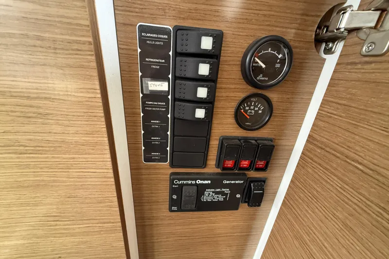 Slide: The Image of Control panel of 2015 Fountaine Pajot Summerland 40 LC with gauges and switches. - 71