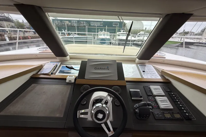 Slide: The Image of Helm of 2015 Fountaine Pajot Summerland 40 LC with Garmin navigation system. - 79