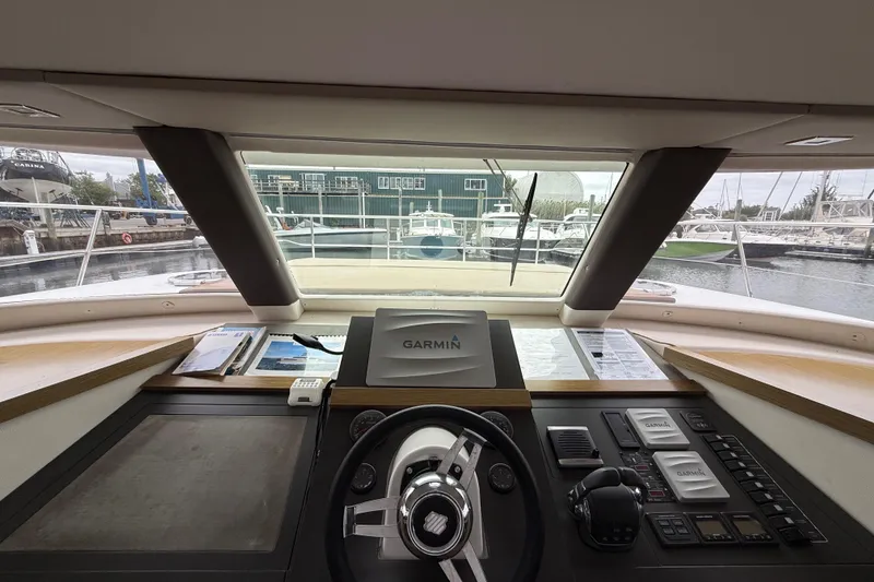 Slide: The Image of Cockpit view of 2015 Fountaine Pajot Summerland 40 LC with Garmin navigation system. - 80