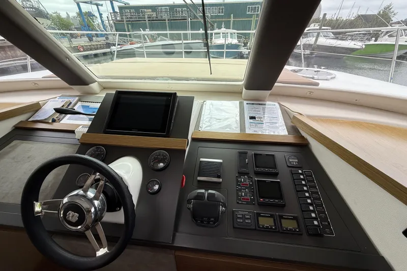 Slide: The Image of Cockpit of 2015 Fountaine Pajot Summerland 40 LC with steering wheel and control panel. - 83