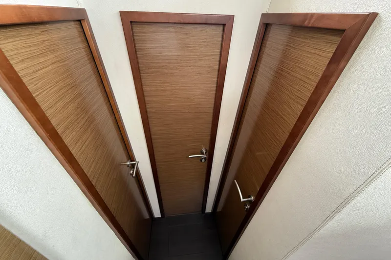 Slide: The Image of Wooden doors inside a 2015 Fountaine Pajot Summerland 40 LC yacht. - 96
