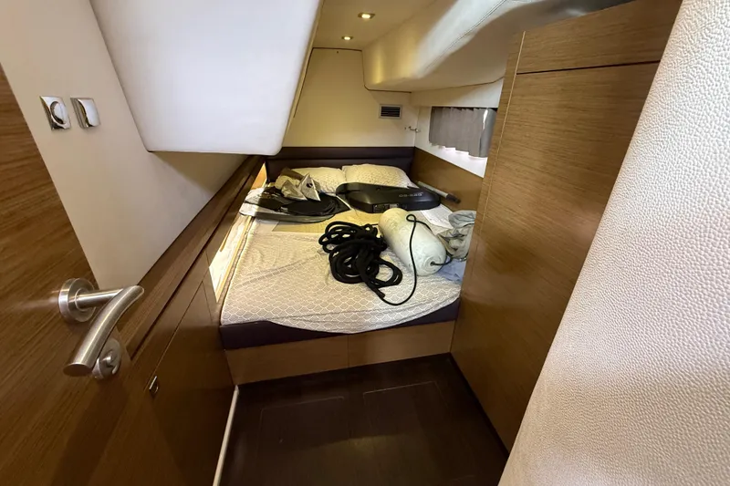 Slide: The Image of Interior cabin of 2015 Fountaine Pajot Summerland 40 LC with bed and storage. - 97