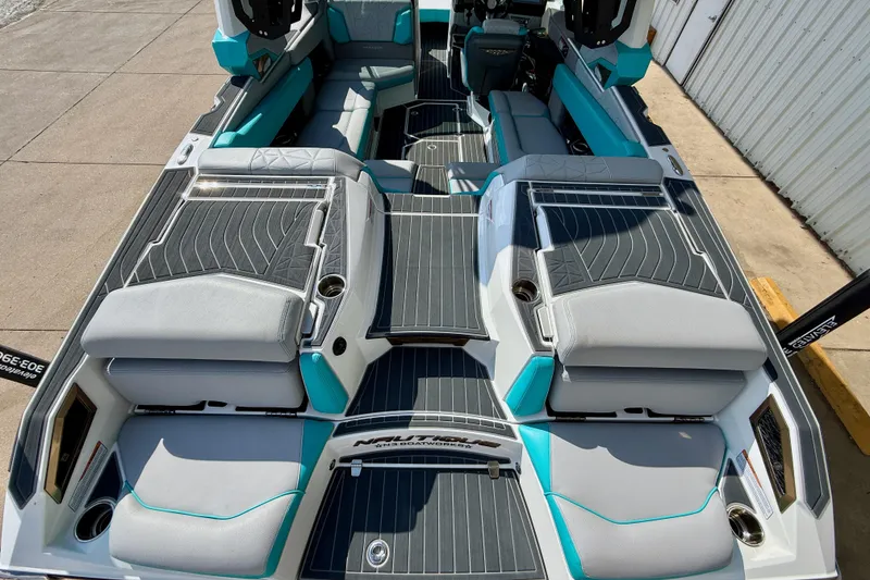 Slide: The Image of 2021 Nautique Super Air Nautique G23 Paragon interior with sleek seating and modern design. - 13