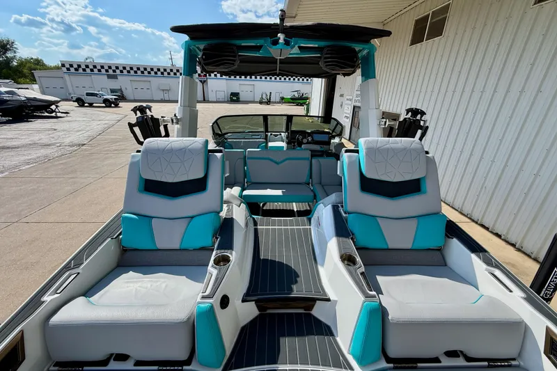Slide: The Image of 2021 Nautique Super Air Nautique G23 Paragon interior with luxurious seating and modern design. - 18