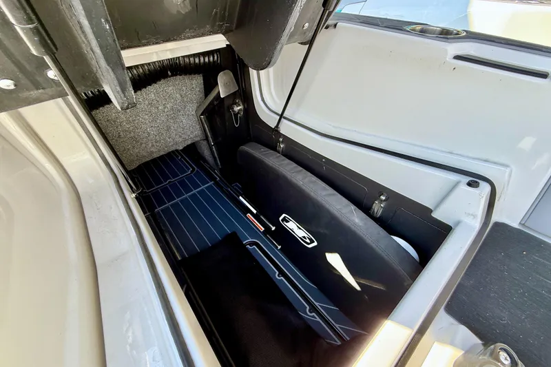 Slide: The Image of Storage compartment of 2021 Nautique Super Air Nautique G23 Paragon boat. - 31