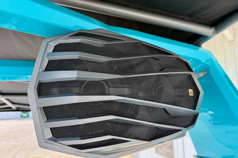 Slide: The Image of Close-up of a 2021 Nautique Super Air Nautique G23 Paragon speaker grille. - 34