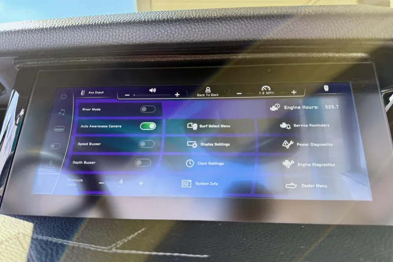 Slide: The Image of 2021 Nautique Super Air Nautique G23 Paragon dashboard display with various control options. - 39