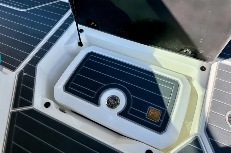 Slide: The Image of 2021 Nautique Super Air Nautique G23 Paragon storage compartment with sleek design and durable materials. - 43