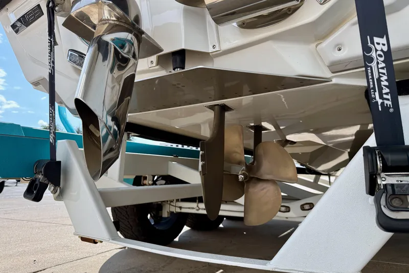 Slide: The Image of 2021 Nautique Super Air Nautique G23 Paragon propeller and exhaust detail. - 5