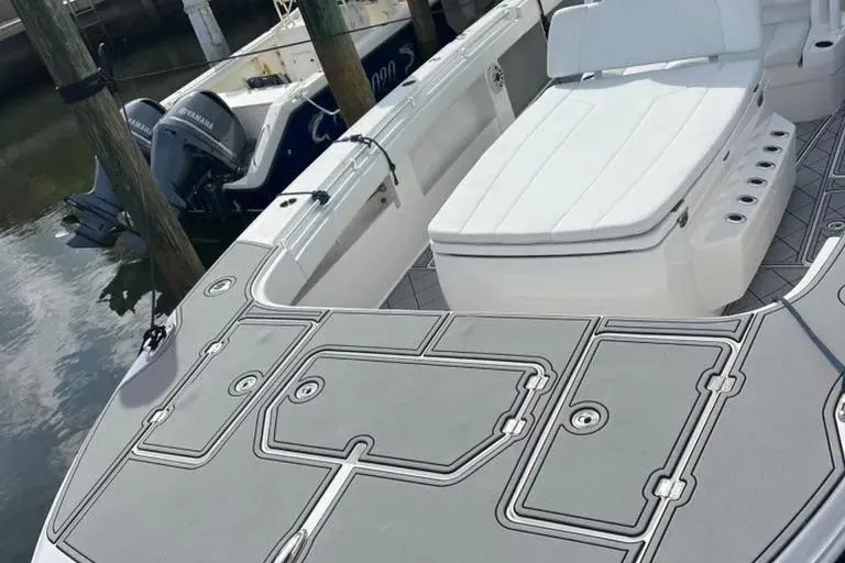 Slide: The Image of 2020 Invincible 40 Catamaran with sleek deck design and comfortable seating. - 19