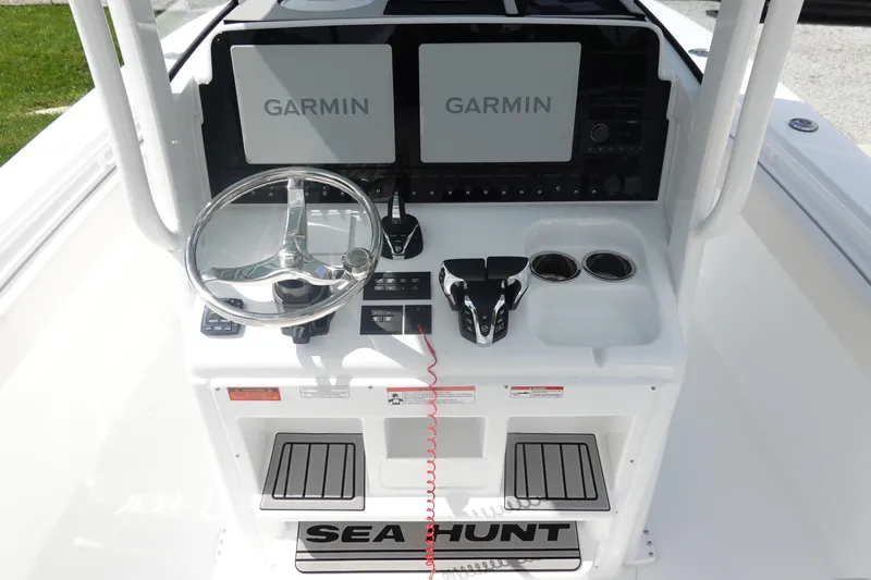 Slide: The Image of Control console of 2026 Sea Hunt Gamefish 27 Coffin Box with Garmin displays. - 19