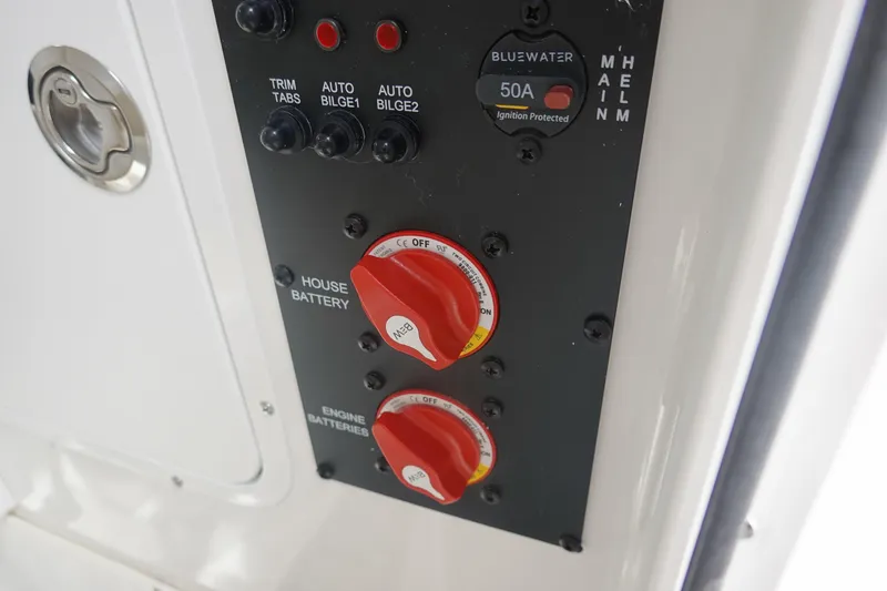 Slide: The Image of Control panel of 2026 Sea Hunt Gamefish 27 Coffin Box boat with battery switches. - 33