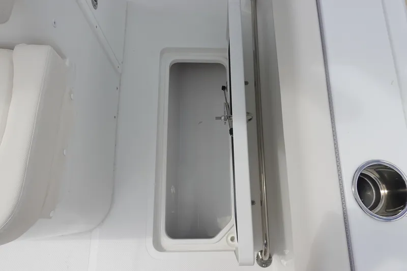 Slide: The Image of 2026 Sea Hunt Gamefish 27 Coffin Box interior with open storage compartment. - 36