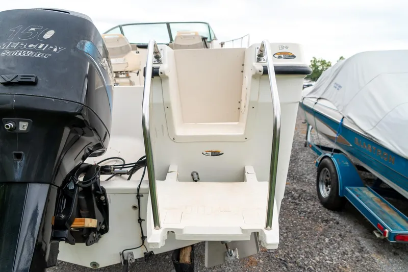Slide: The Image of Bayliner 2302 Trophy Walkaround 2002 with Mercury 150 Saltwater engine, rear view. - 9