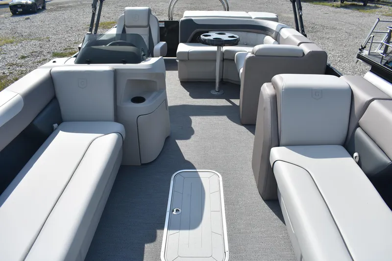 Slide: The Image of 2026 Godfrey Sweetwater SW 2286 C pontoon boat interior with spacious seating and table. - 1