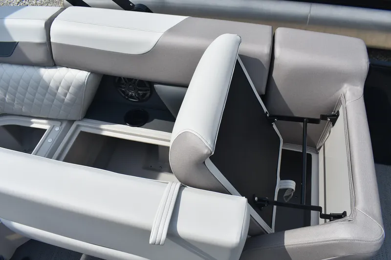 Slide: The Image of 2026 Godfrey Sweetwater SW 2286 C boat seat with storage compartment open. - 10